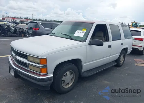 1999 Chevrolet Tahoe Lt z USA, uszkodzony, nr VIN 1GNEC13RXXJ303585